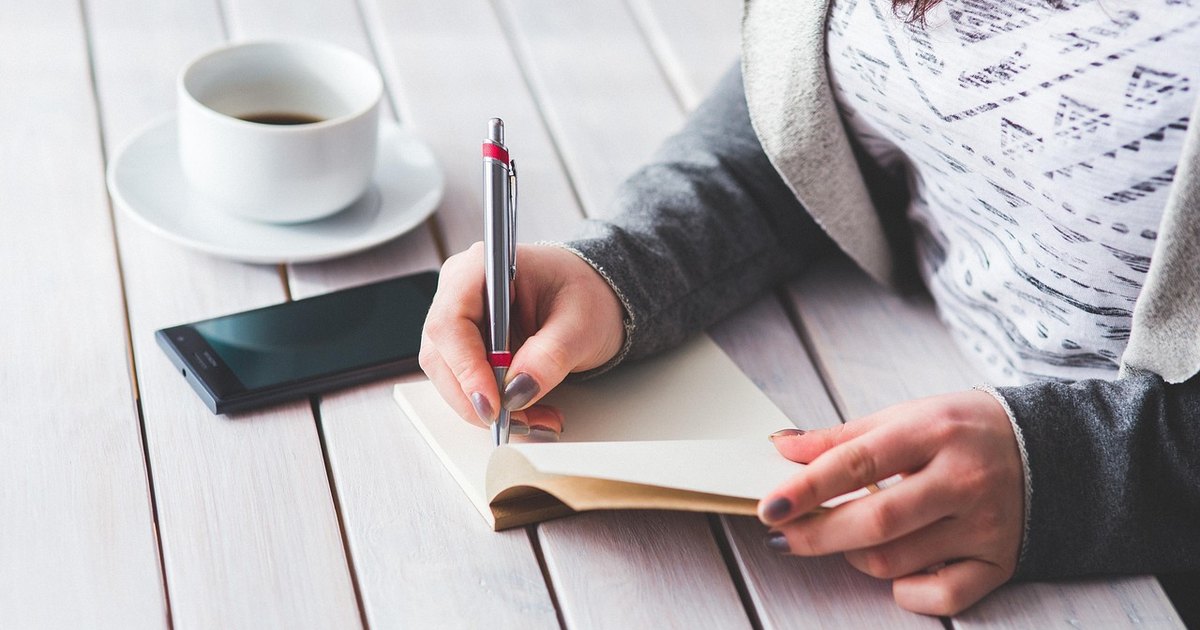 Ascending channel pattern - person writing notes desk