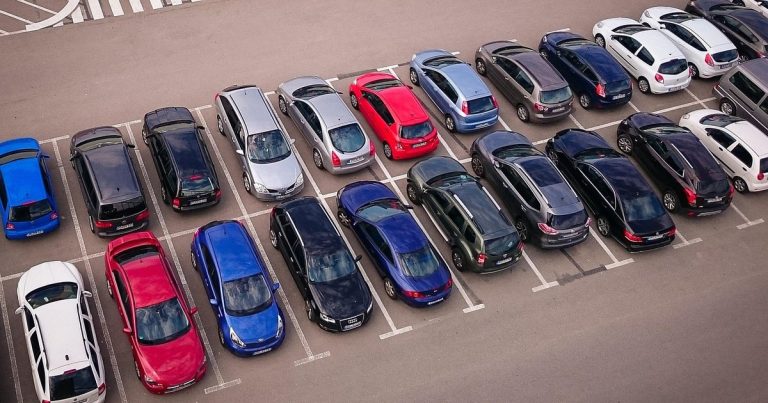 Auto stocks to watch october 15 - cars parking lot