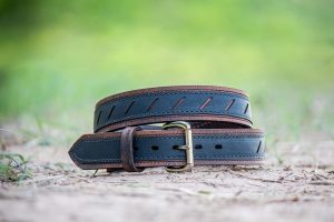 Belt hold candlestick pattern: a rolled leather belt with a metal buckle