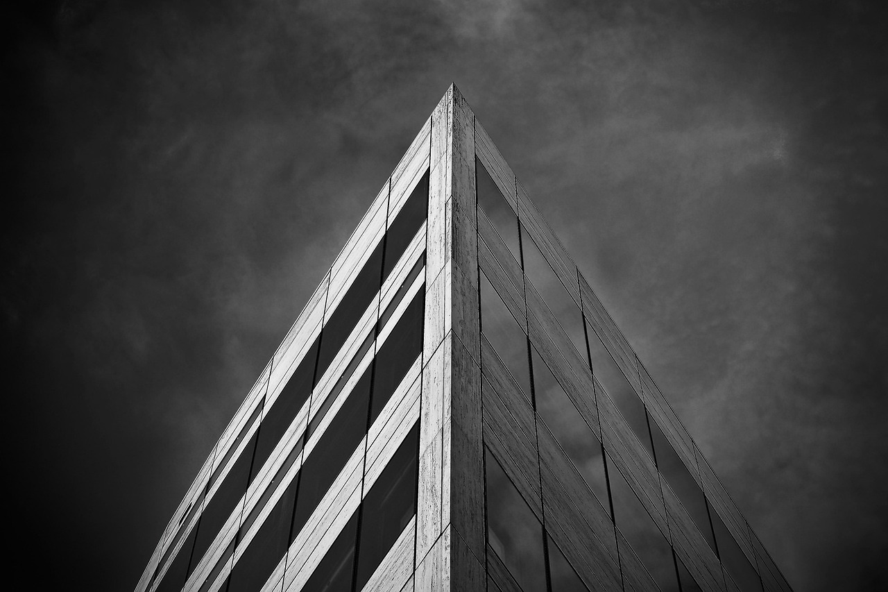 EAAA India Alternatives IPO: modern office building against a cloudy sky