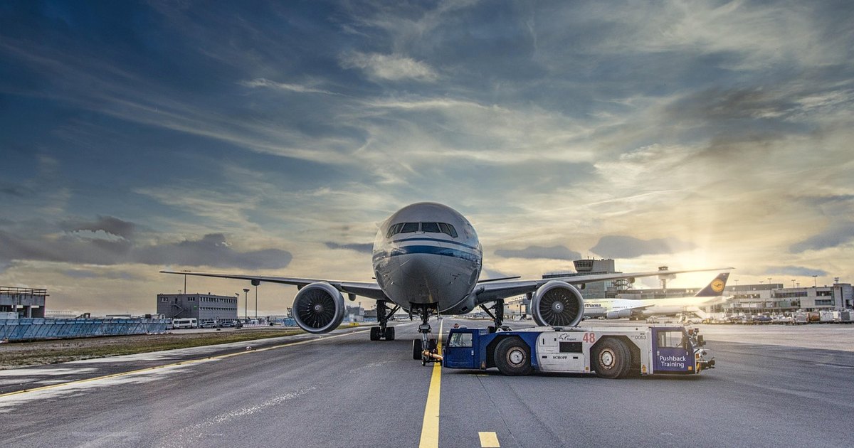 Crude oil impact on indian stock market - airplane sunset
