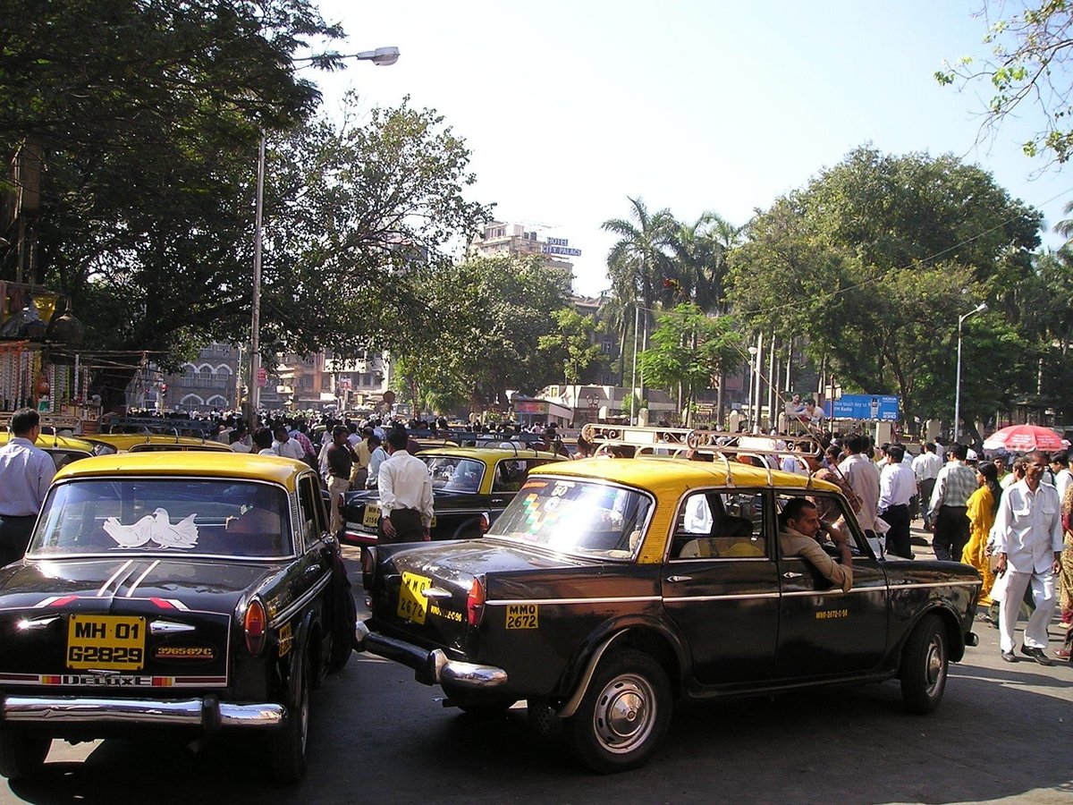 Busy Mumbai road with yellow taxis for the Dalal Street October 12 recap
