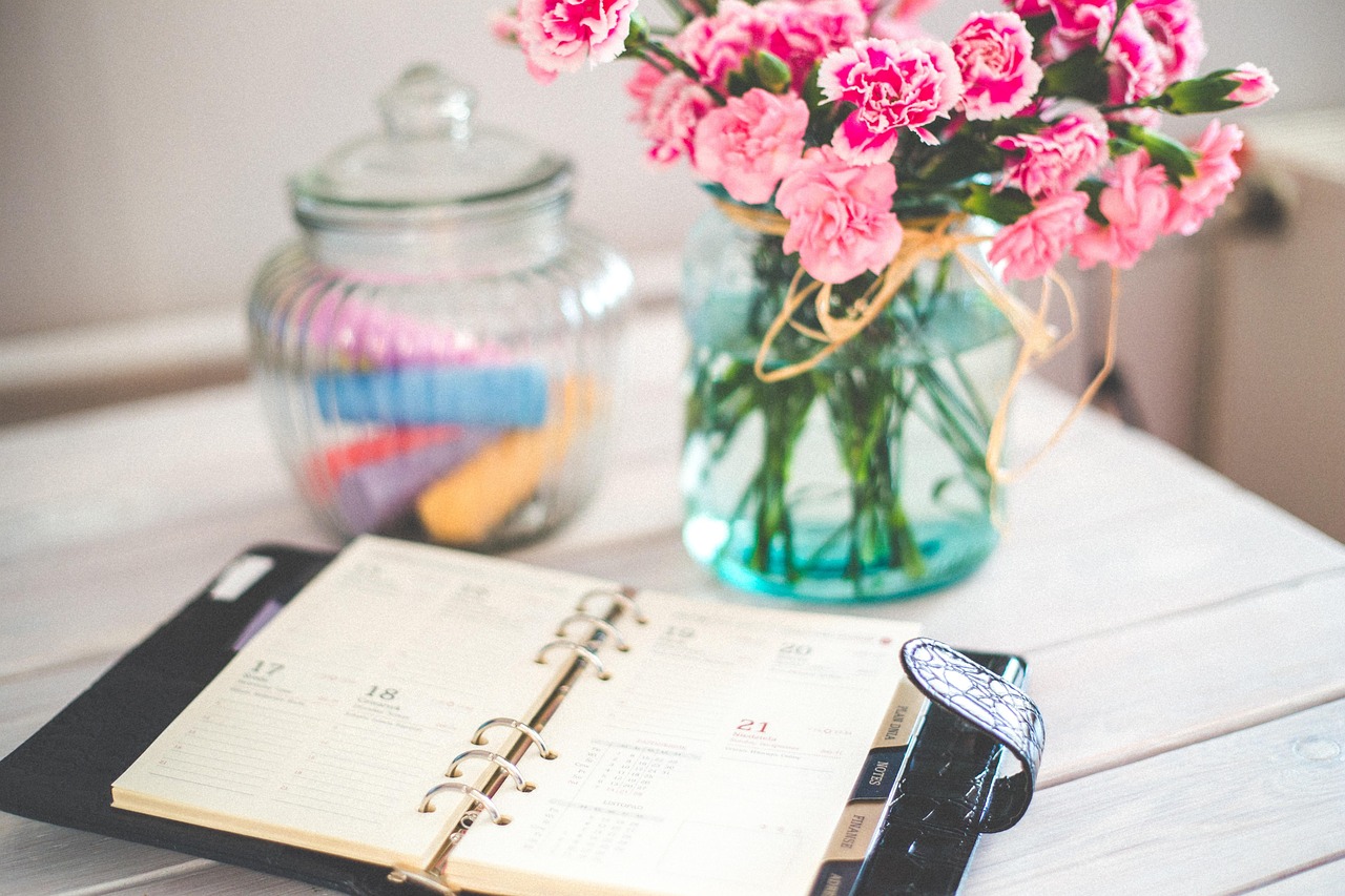 Deferred revenue: an open planner with future dates on a desk, like cash received now for service still to come