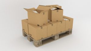 Delhivery Q2 results: cardboard parcels stacked on a wooden pallet