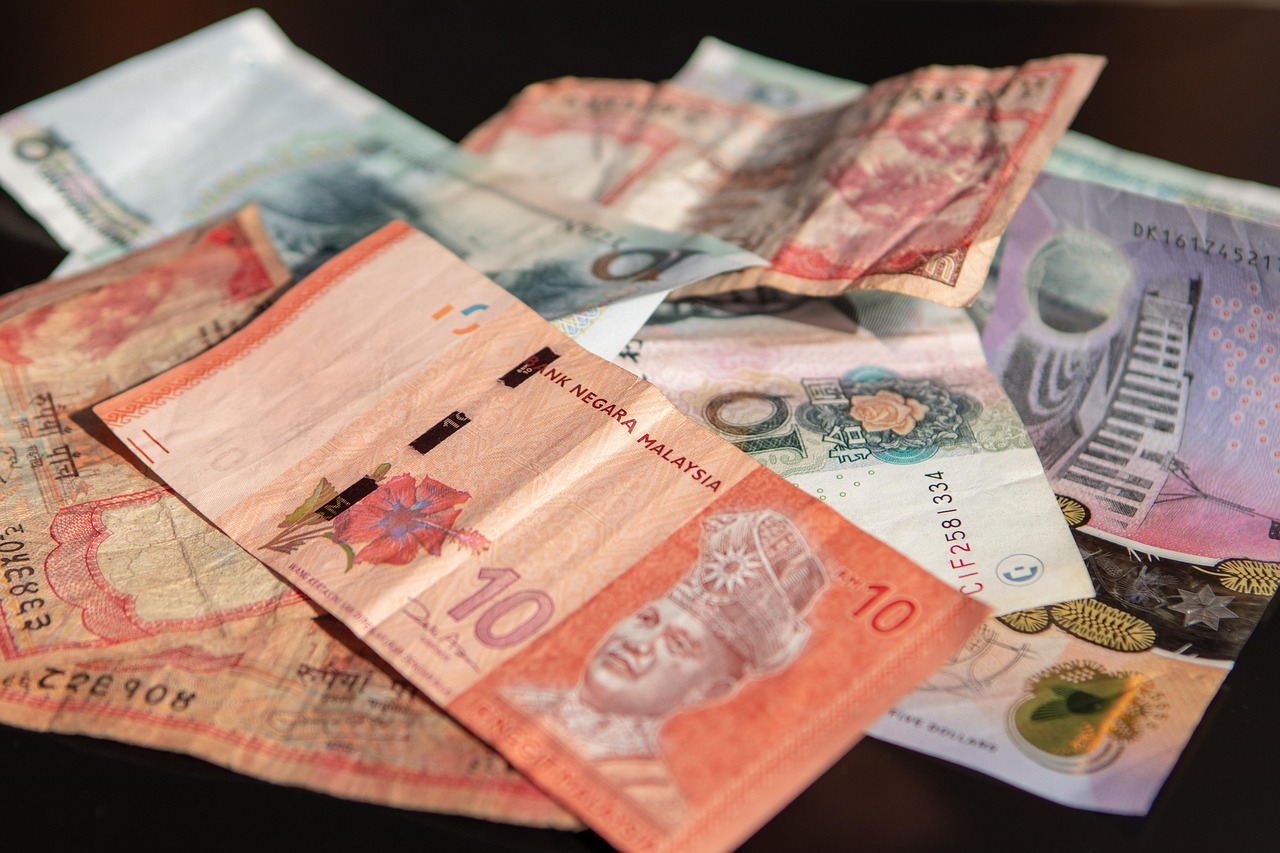 FII DII data October 26: banknotes from several countries spread on a table, a picture of foreign and domestic money flows