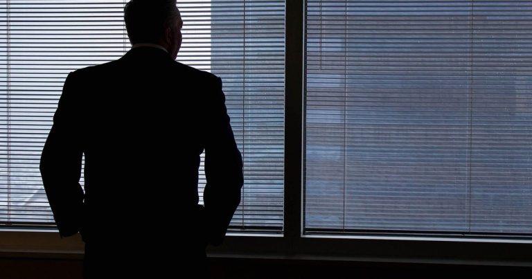 Hanging man candlestick pattern - businessman thinking