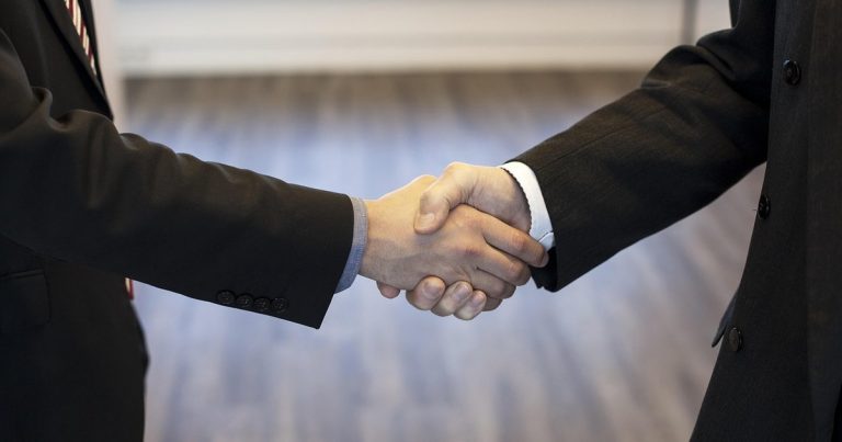 Hd fire protect ipo opens today - business handshake