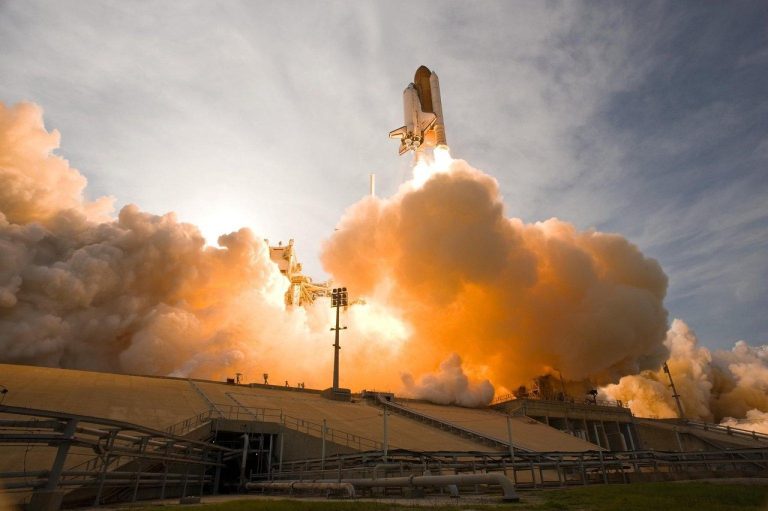 Call ratio backspread concept: a space shuttle lifting off on a column of orange exhaust, standing for a sharp upward move