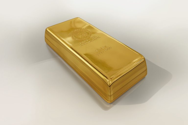 Gold ETF in India: a single polished gold bar of the kind fund custodians hold in vaults