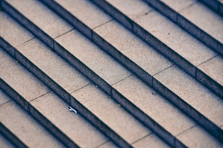 Stock appreciation rights: grey stone steps rising diagonally, a picture of value climbing step by step