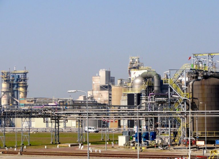SRF Q2 results: a chemical plant with tanks, pipework and towers under a clear sky