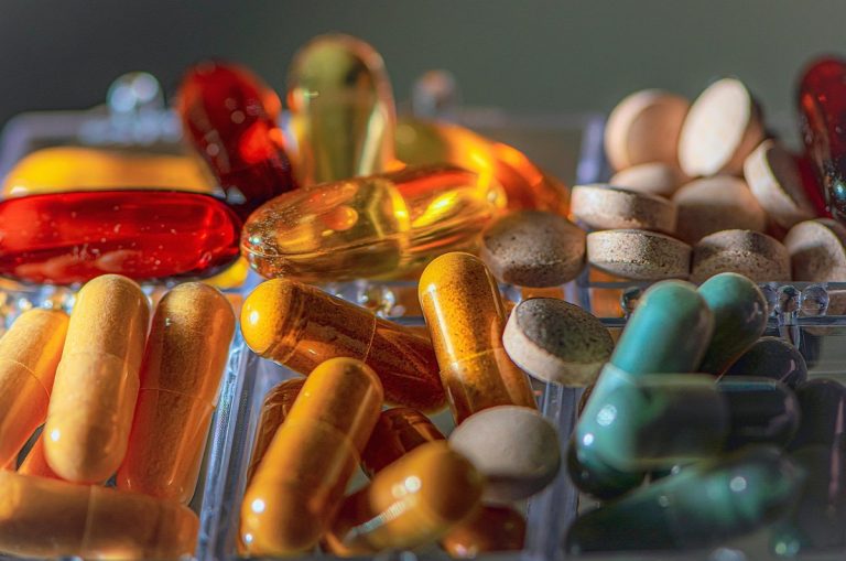 Alkem forensic audit: assorted pharmaceutical capsules and tablets in a clear tray