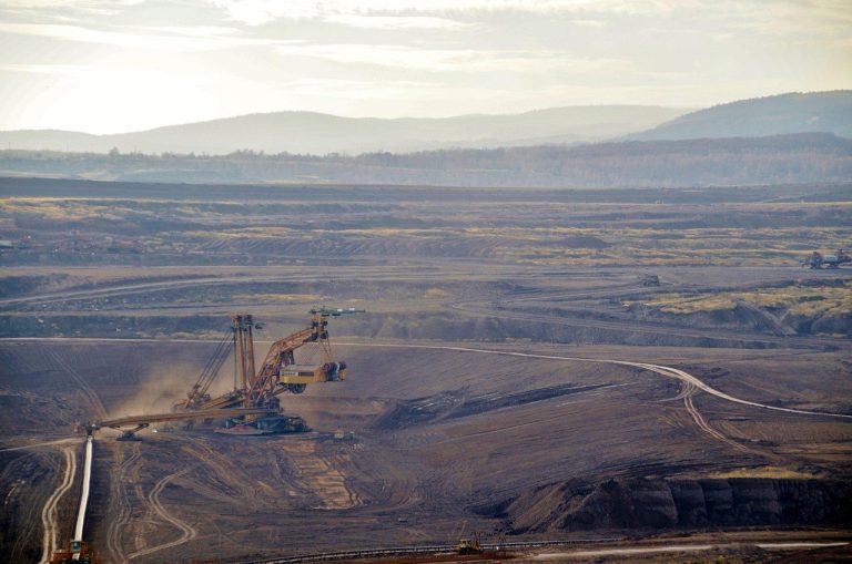GMDC dividend: bucket-wheel excavator working in an open-pit lignite mine