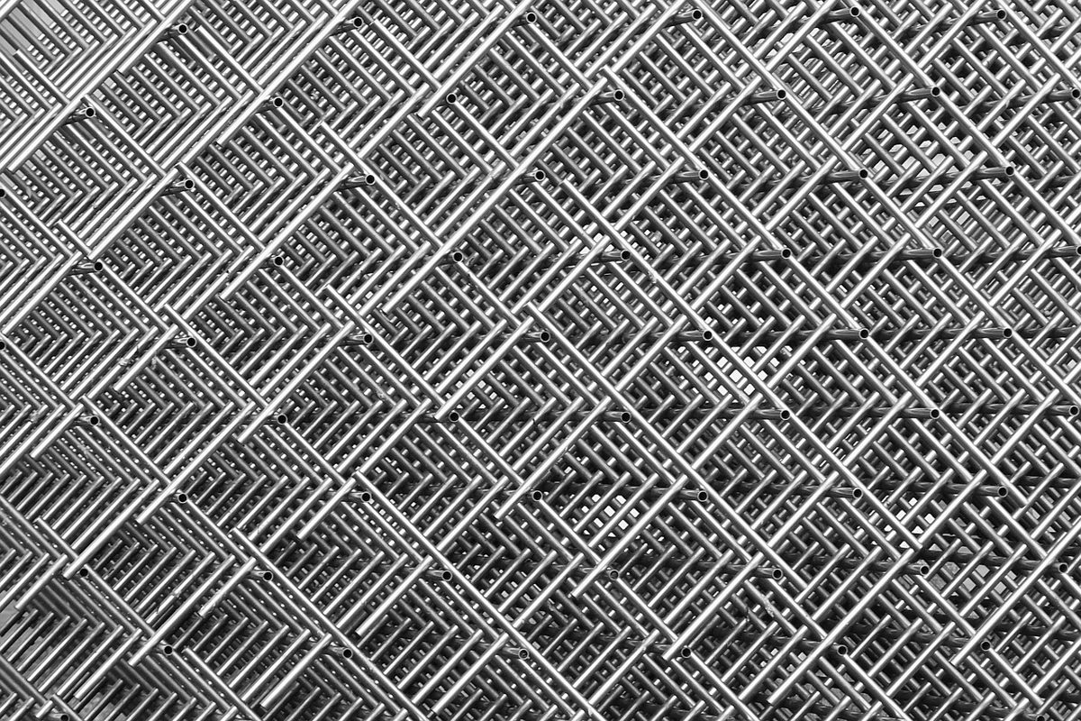 Jindal Stainless Q2 results: a criss-cross lattice of stainless steel rods and tubes