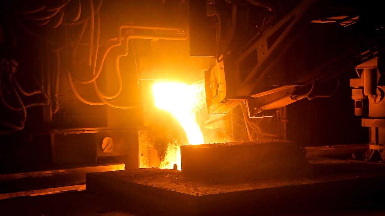 JSW Steel Q2 results: molten steel pouring inside a blast furnace at a steel plant