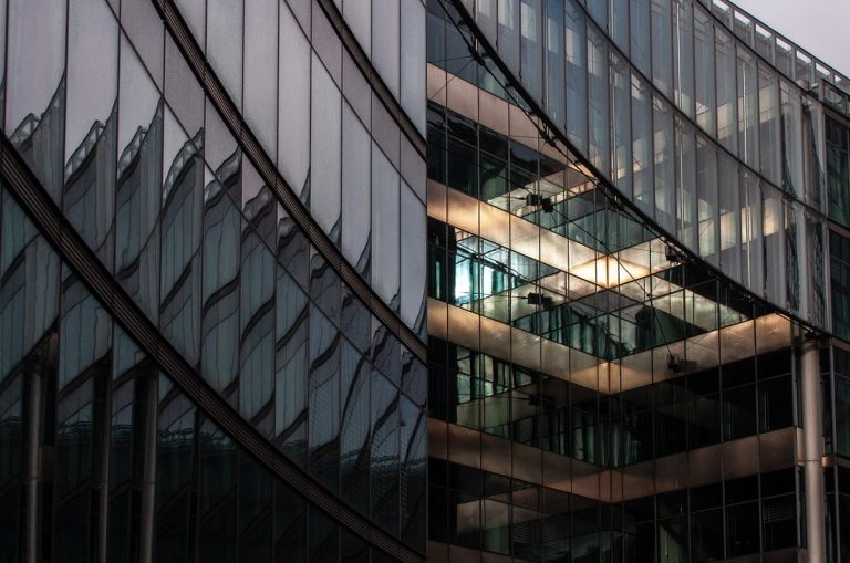 Glass office building facade for the Nifty October 16 recap