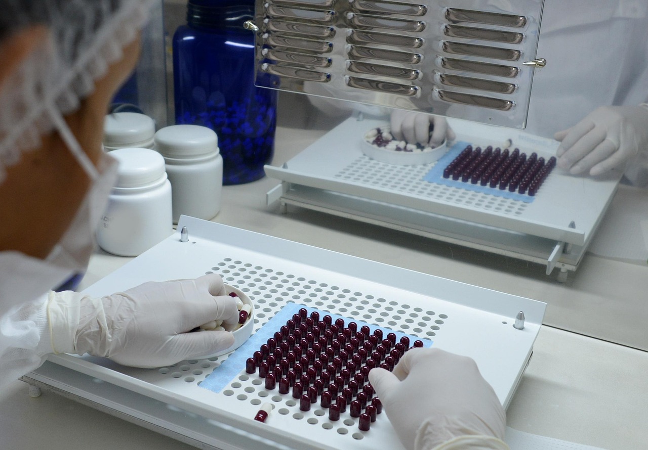 Lupin Goa FDA inspection: gloved technicians filling capsules in a pharmaceutical lab