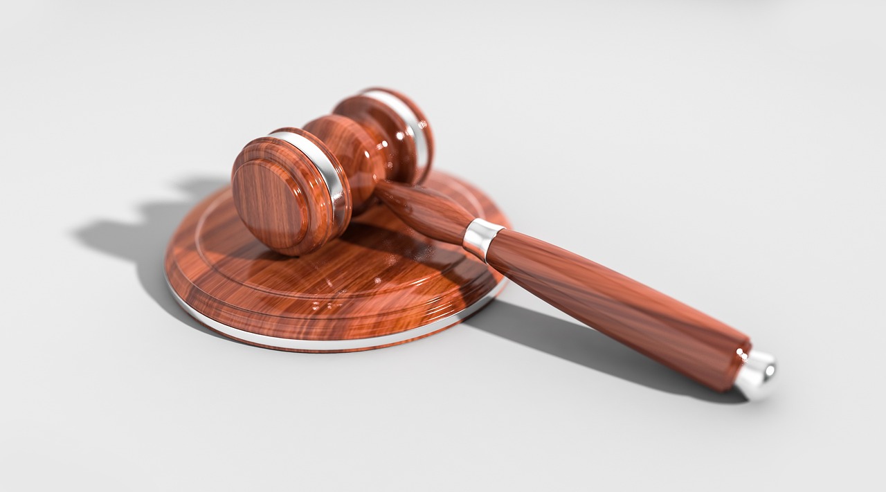 Periodic call auction concept: wooden auction gavel resting on its sound block