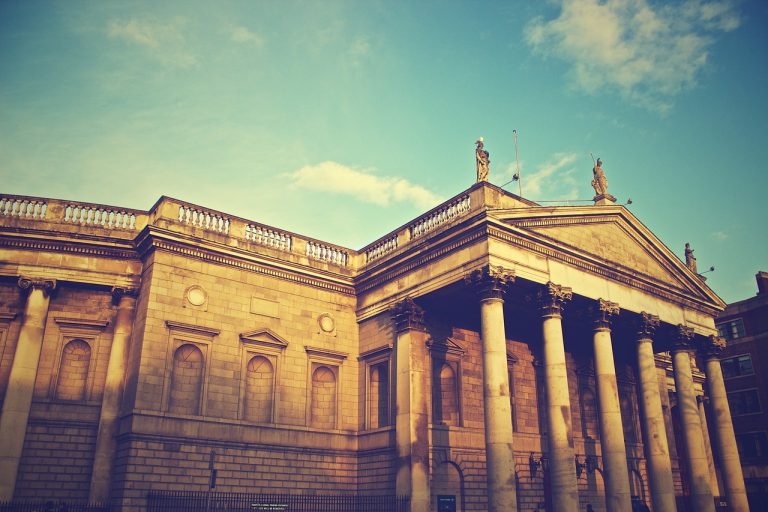 Punjab & Sind Bank Q2 results: classical stone bank building with tall columns under a blue sky