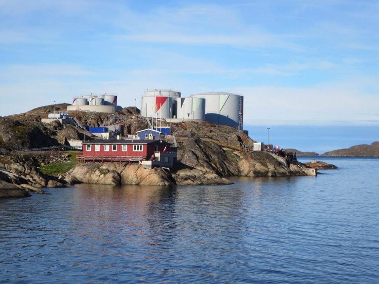 Oil storage tanks at a coastal terminal for the rupee and crude oil October 2026 update