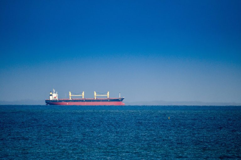 Russian oil waiver India: a cargo tanker sailing on calm blue sea under a clear sky