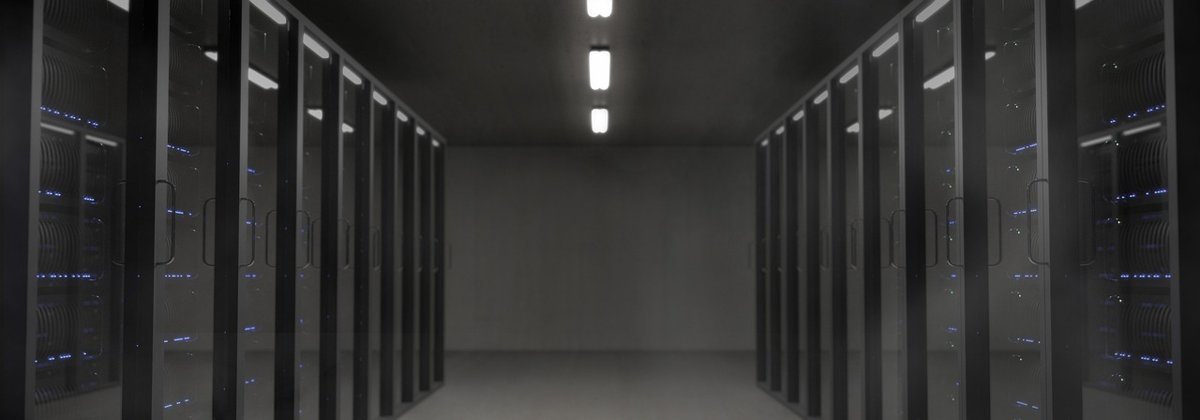 Rows of server racks in a dark data centre for the Sensex Nifty October 13 recap