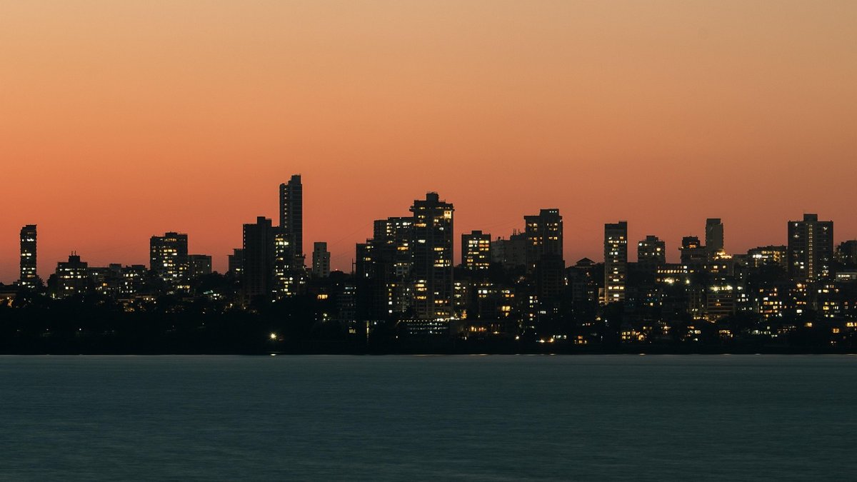 Mumbai skyline at dusk for the Sensex and Nifty October 5 recap