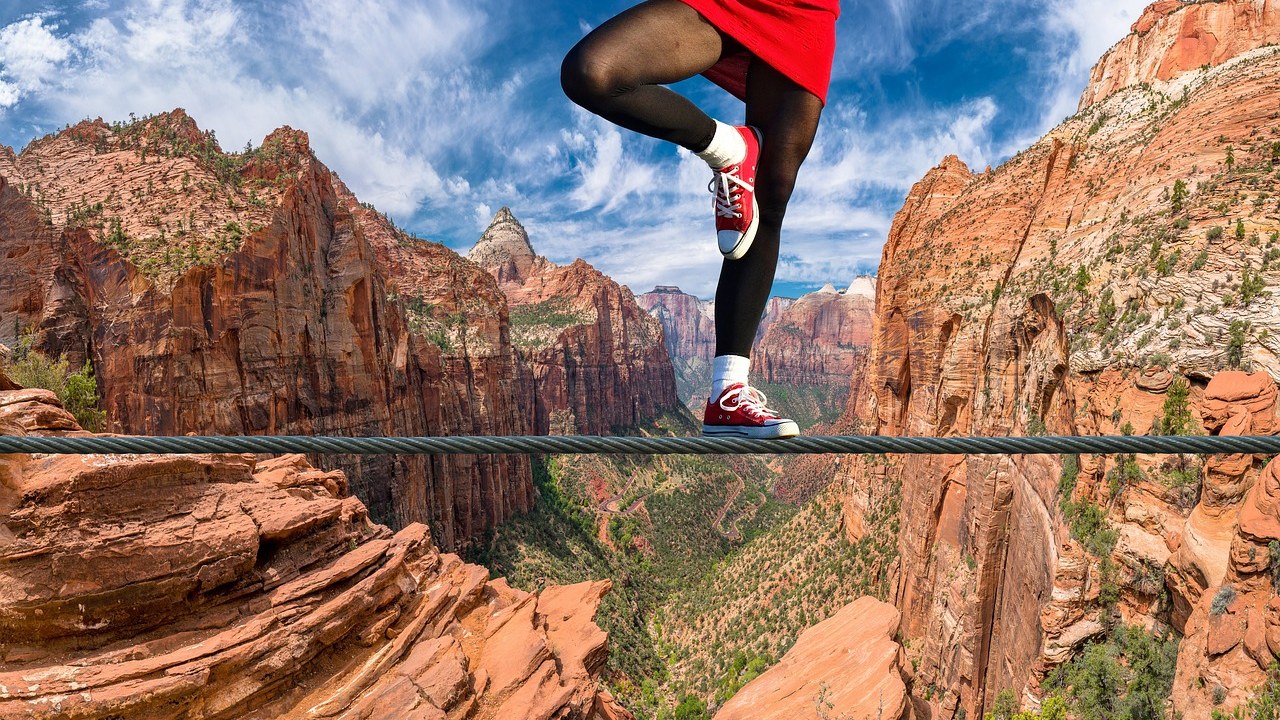 Short strangle strategy on Nifty: a person balancing on a steel rope over a canyon, like an option seller inside a wide range with a long drop on either side