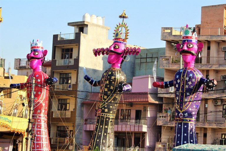 Stock market holiday today for Dussehra: tall Ravana, Kumbhkaran and Meghnath effigies standing on a city street