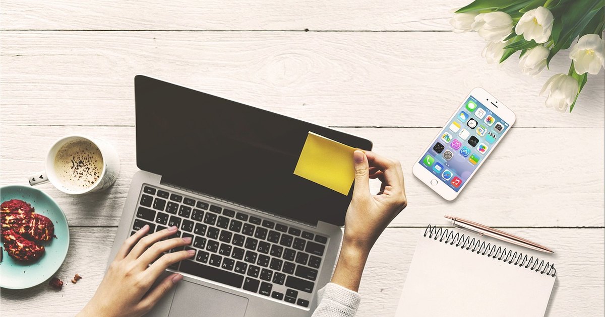 Stocks to watch today - laptop typing hands