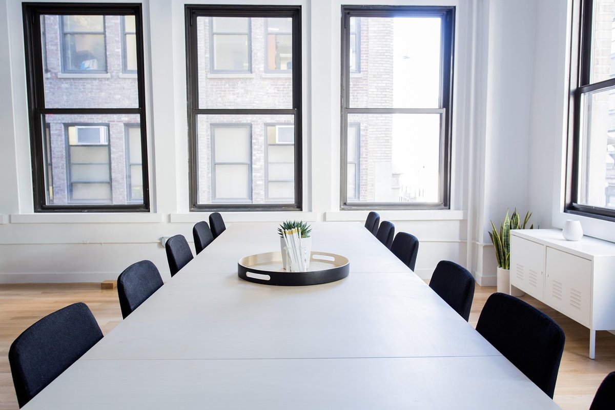 Trent director resignation: an empty boardroom table lined with black chairs