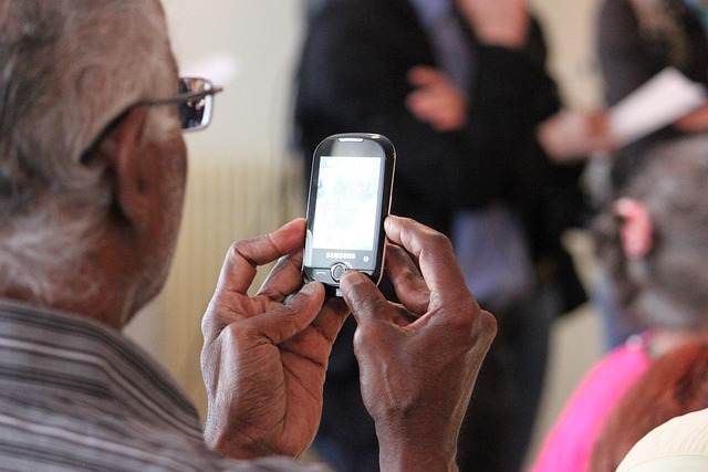 UPI mandate in IPO: an older man approving a request on his mobile phone