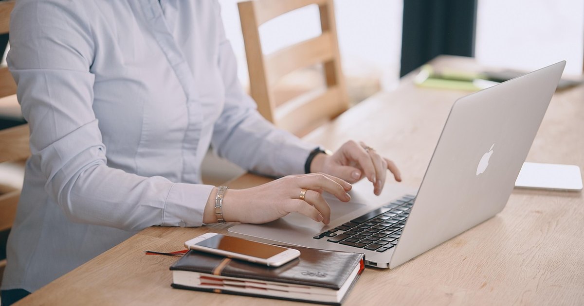 What is ebitda margin - laptop typing hands
