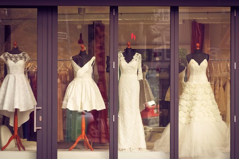 Window dressing in mutual funds: a shop window with dresses on display mannequins